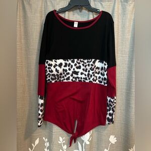 Red and black patterned sweater